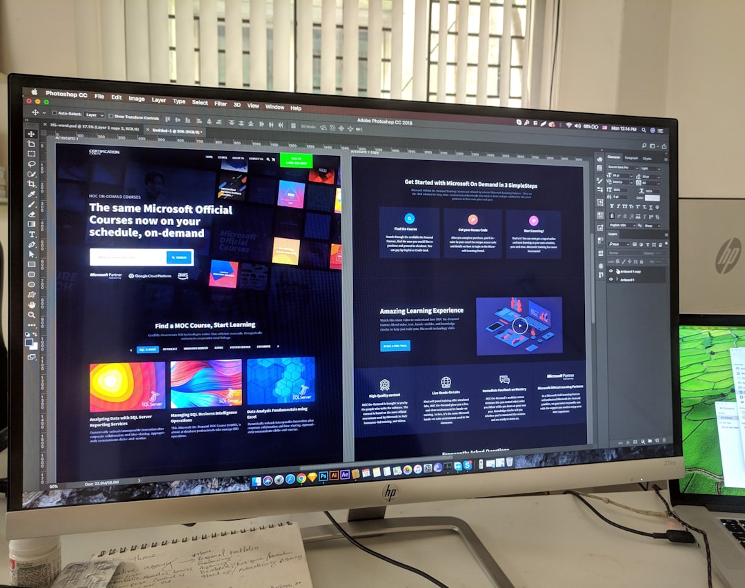 Designer sketching UX wireframes on a tablet with a stylus