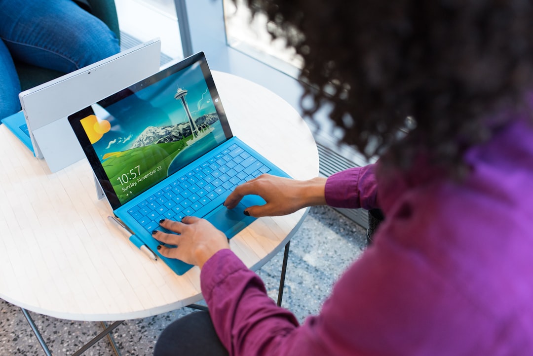 Person using a laptop with an AI-powered interface